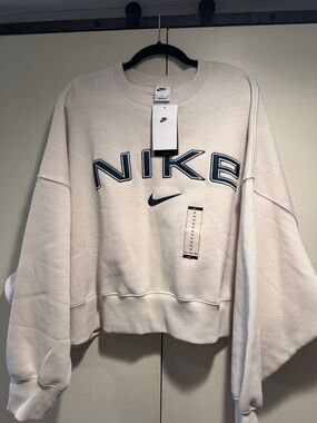Nike Women's Light Cream Crewneck Sweatshirt with Navy Logo
